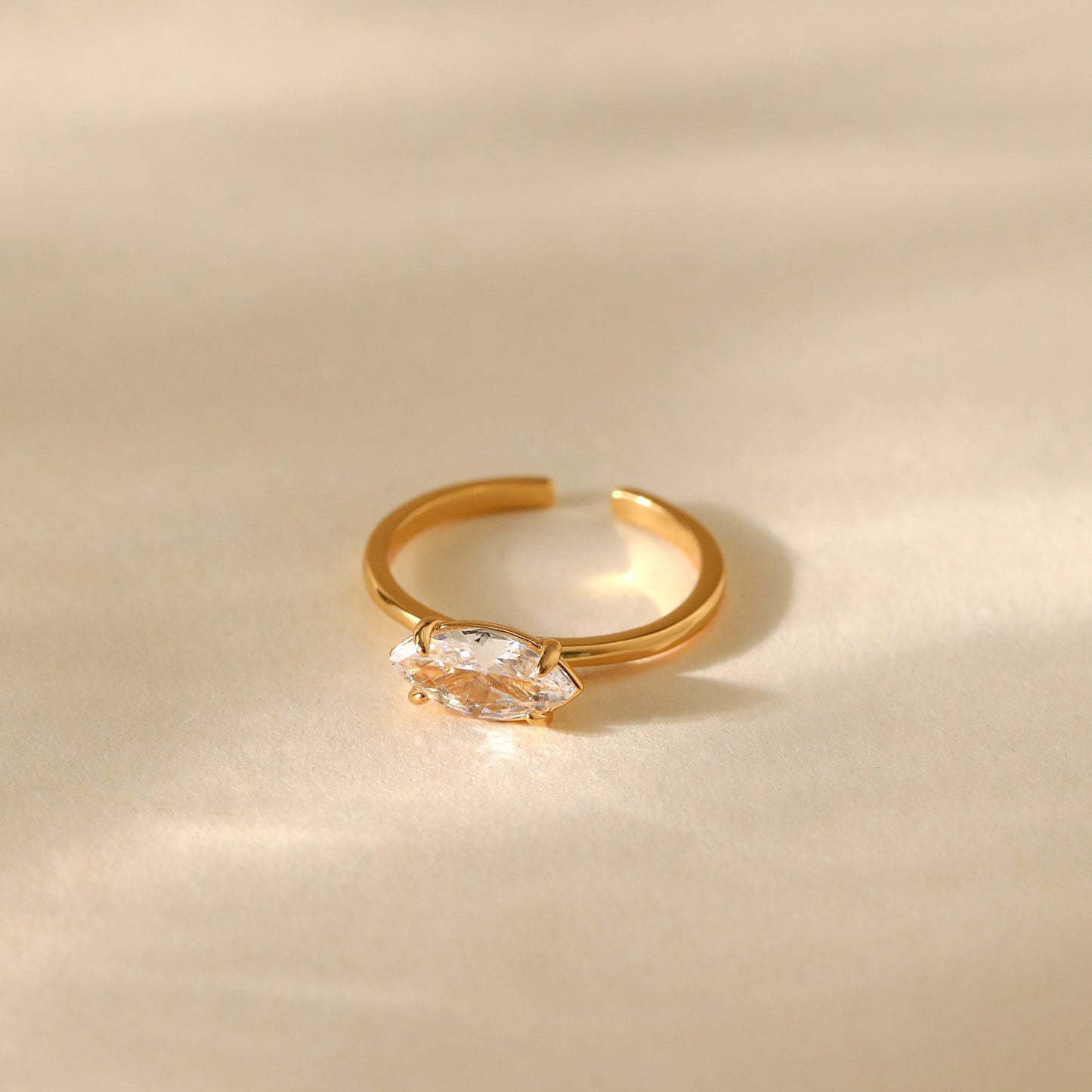 Gold Plated Ring with Marquise shaped White Stone