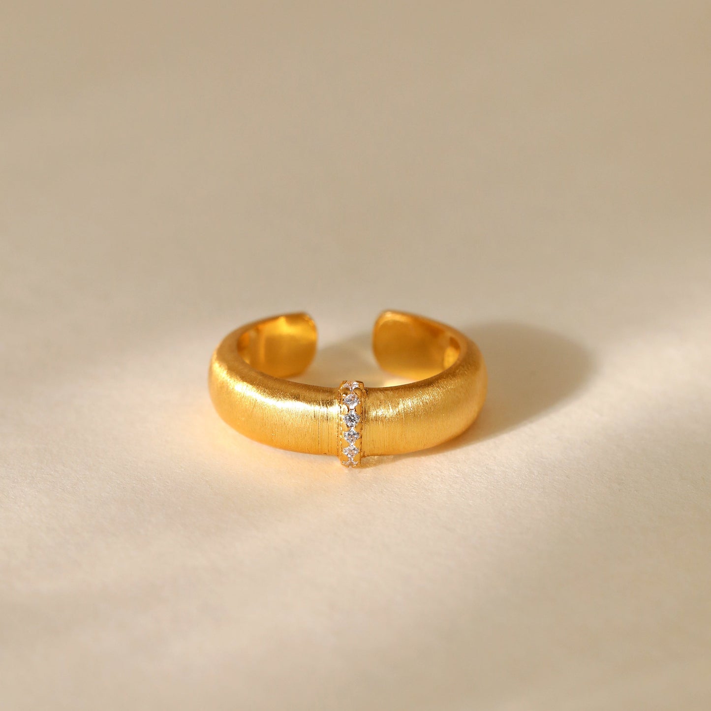 Gold Plated Ring with Lined Stones