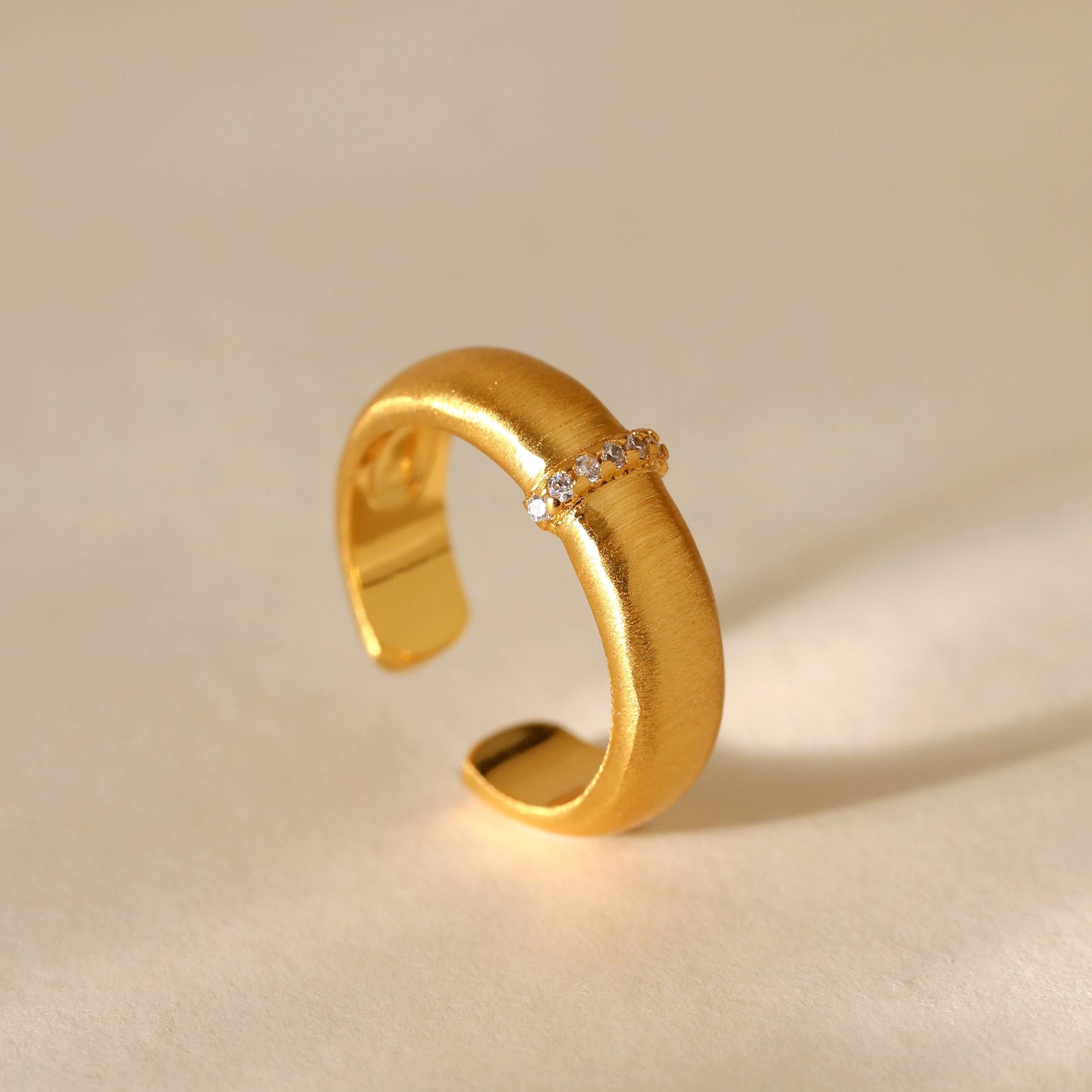 Gold Plated Ring with Lined Stones